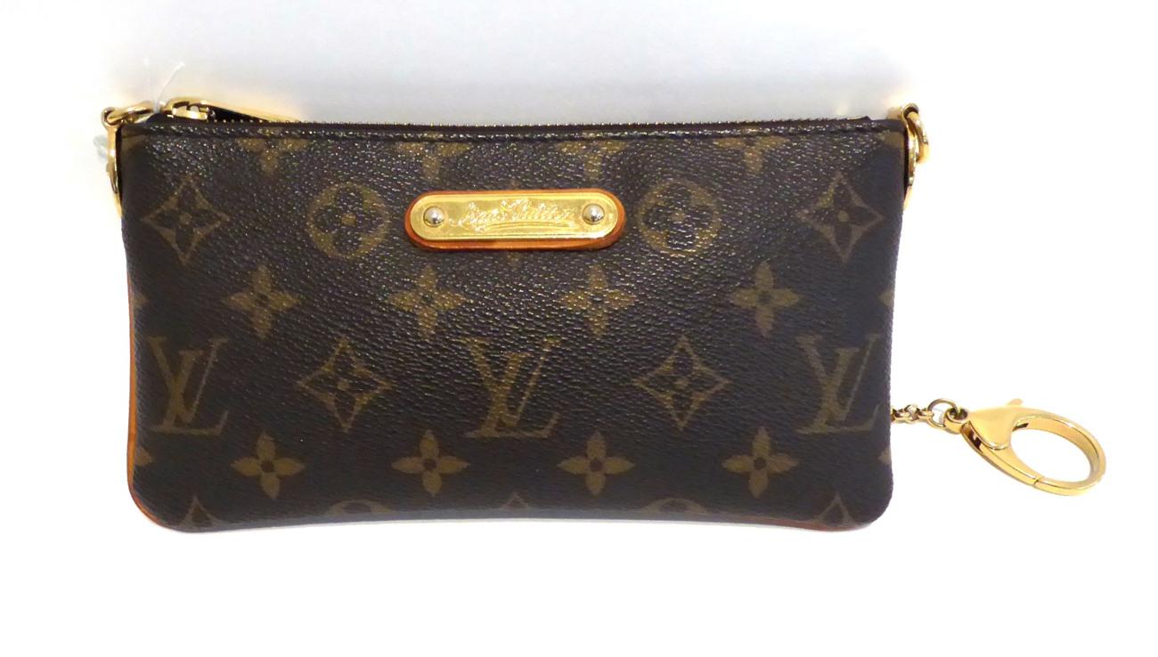 Lot 2130 - Louis Vuitton Monogram Coin Purse, on gilt metal chain and bag clip, 20cm by 11cm, with dust bag