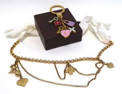 Lot 2133 - Louis Vuitton Gilt Metal Bag Charm / Keyring, with pastel enamelled Monogram charms, with box;...