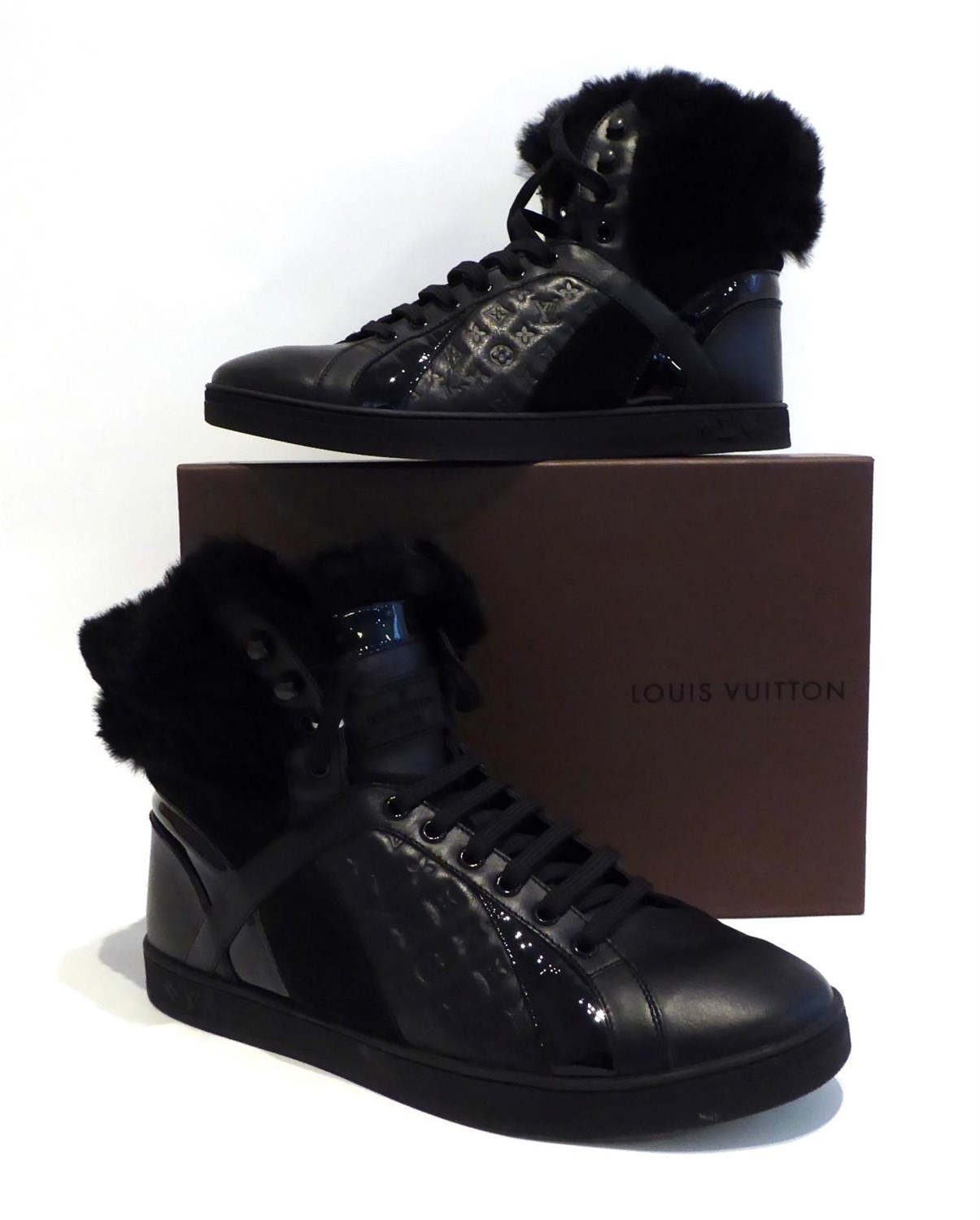 Lot 2146 - Pair of Louis Vuitton Black Hightop Sneakers, with panels with embossed monogram design and fur...