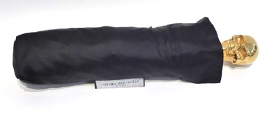 Lot 2150 - Alexander McQueen Black Umbrella, with gilt metal skull handle and cover