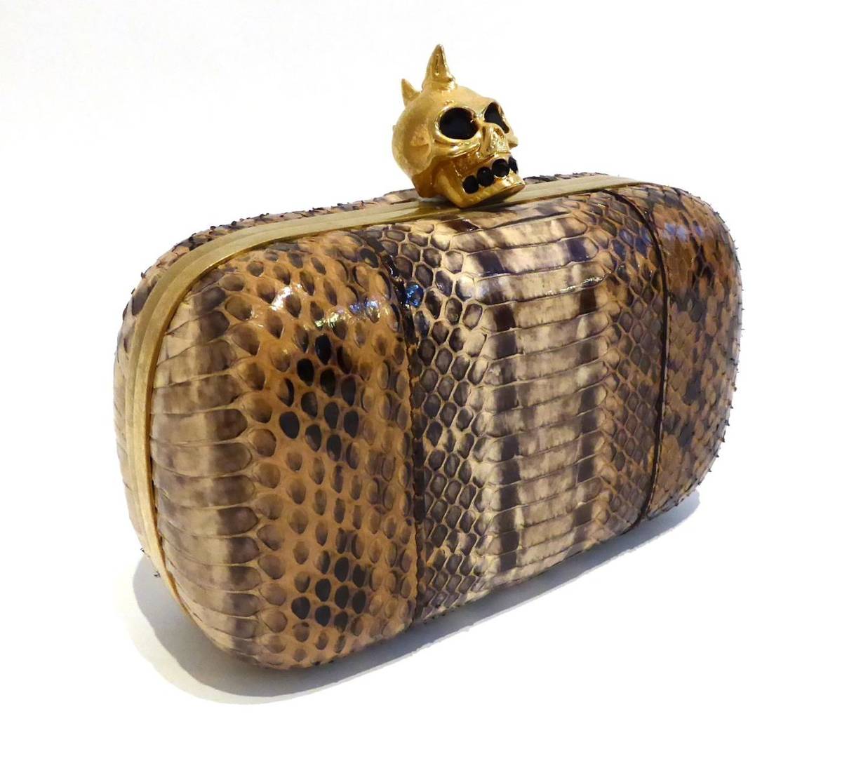 Lot 2151 - Alexander McQueen 'Classic Skull Clutch', hard clutch bag in brown, cream and black snakeskin, with