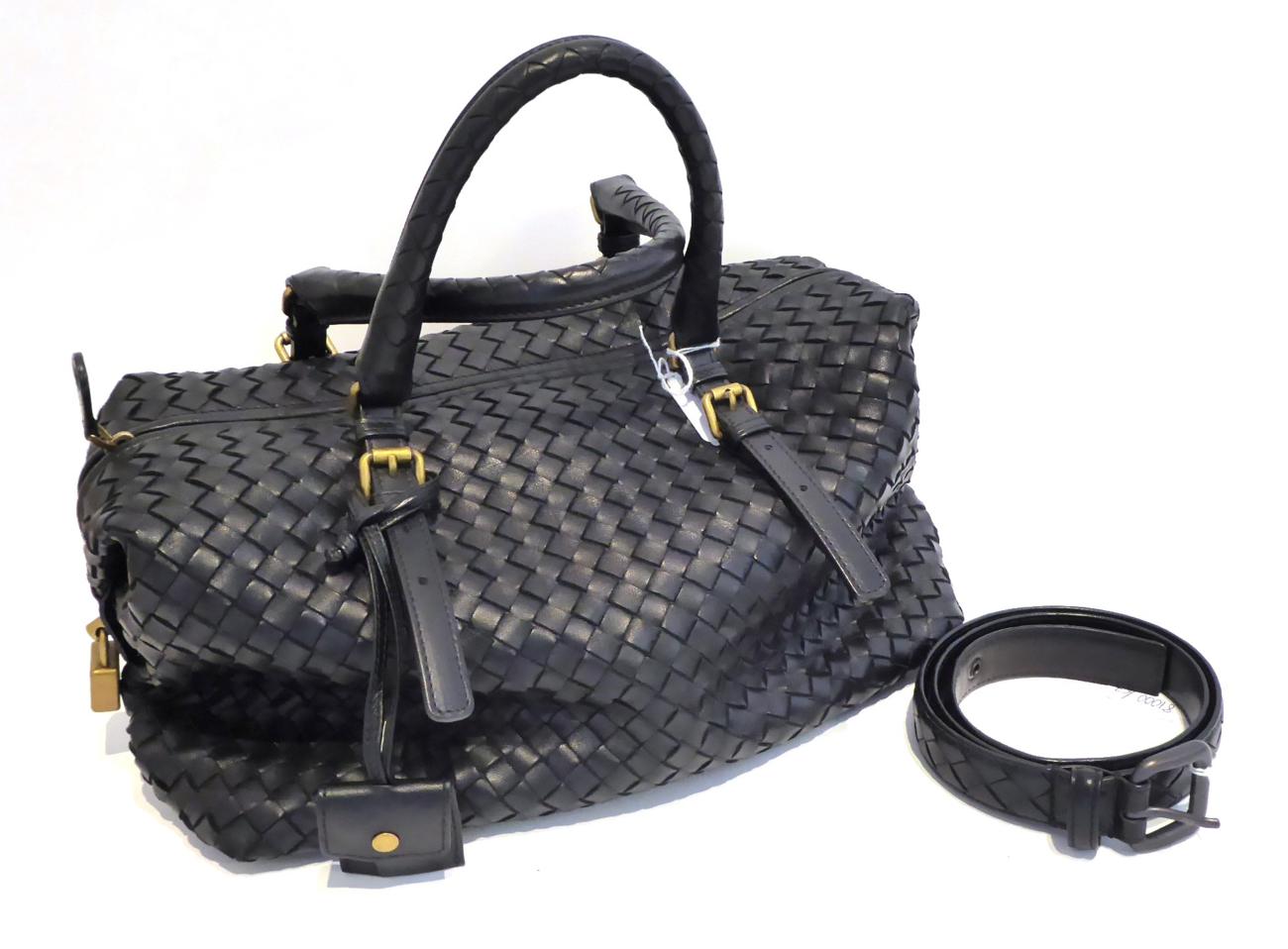 Lot 2156 - Bottega Veneta Black Woven Leather Handbag, with bronze coloured padlock to zip, 30cm by 24cm...