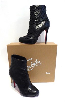 Lot 2171 - Pair of Christian Louboutin Black Leather 'Fish Scale' Textured Ankle Boots, (size 38), with...
