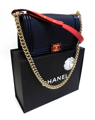 Lot 2184 - Chanel Blue Leather Shoulder Bag, with red enamelled clasp and chain handle, internal serial...