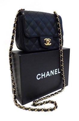 Lot 2185 - Chanel Black Quilted Classic Flap Bag, with long chain weave strap, 18cm by 13.5cm by 7cm, with...
