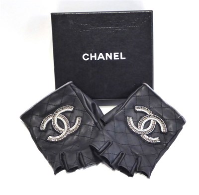 Lot 2189 - Pair of Chanel Black Leather Quilted Fingerless Gloves, silver coloured trim to cuff and beaded...