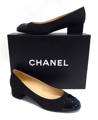 Lot 2194 - Pair of Chanel Black Block Heel Pumps, with stitched interlocking 'CC' motif on patent toes,...