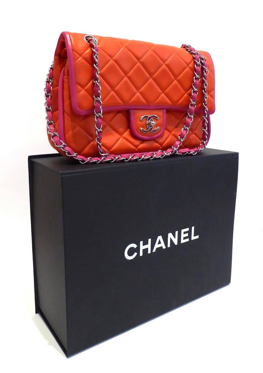 Lot 2199 - Chanel Red Quilted Lambskin Leather Flap Bag, with hot pink trim and double weave chain...