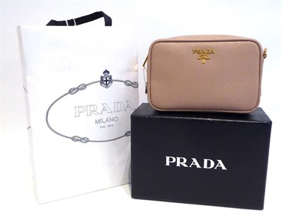 Lot 2220 - A Prada Clutch Bag, with gilt metal mounts and zip fastening, boxed, 15cm by 10cm by 6cm