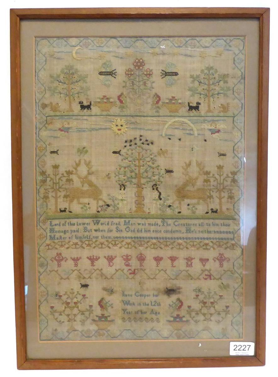 Lot 2227 - An Early 19th Century Adam and Eve Sampler, worked by Jane Cooper age 12, with central...