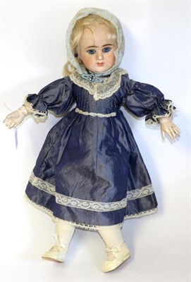 Lot 2003 - French Etienne Denamur Bisque Socket Head Doll, with blond wig, fixed blue eyes, pierced ears...