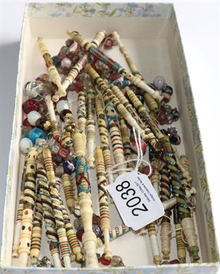 Lot 2038 - Thirty Assorted 19th Century Lace Makers Bone Bobbins, with carved, stained and bead bound...