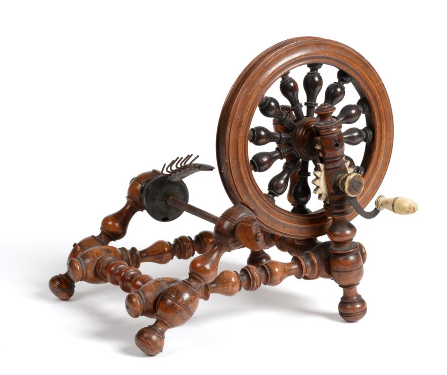 Lot 2044 - Early 19th Century Walnut Bobbin Turned Winder, with a spoke filled wheel, turned by an ivory...