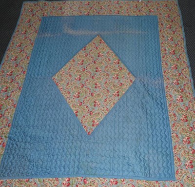 Lot 2061 - Circa 1930's Blue and Floral Printed Quilt, 200cm by 250cm