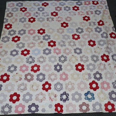 Lot 2069 - 19th Century Patchwork Cover, incorporating coloured cottons in hexagonal flower head shapes,...