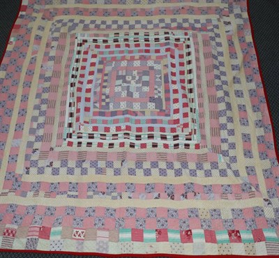Lot 2080 - 19th Century Mosaic Patchwork Quilted Bed Cover, incorporating floral sprigged pinks, lilacs...