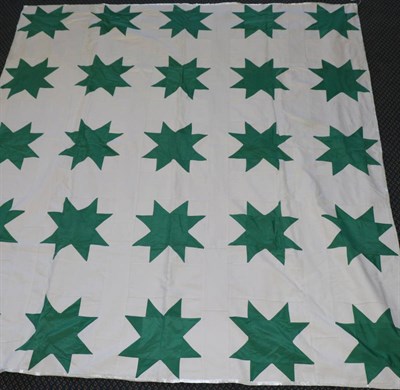 Lot 2081 - Decorative Patchwork Cover, worked in blocks of white cotton with eight point green stars,...