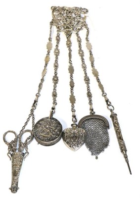Lot 2093 - Silver Chatelaine of Floral Scrolled Form, with hinged clip hung with five accessories on fancy...