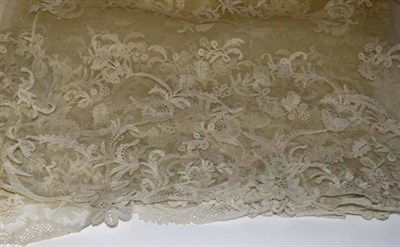 Lot 2106 - Honiton White Lace Flounce of floral design,  40cm by 440cm