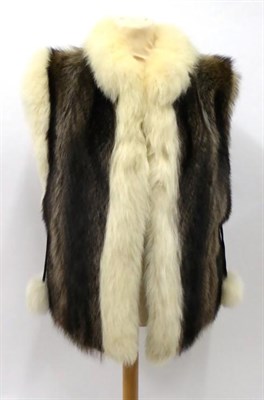 Lot 2124 - Silver Tipped Fox Fur Gilet/Waistcoat, white fox fur trim, black suede waist ties hung with...