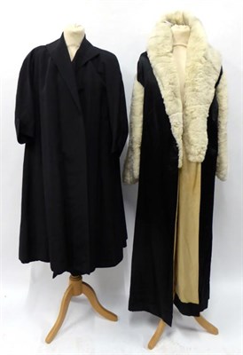 Lot 2134 - Circa 1930s Harrods Evening Coat, of black silk with white rabbit fur sleeves and collar;...