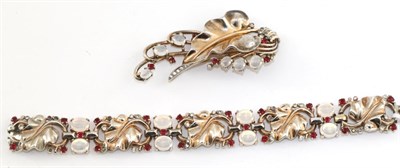 Lot 2186 - A Trifari Paste Bracelet and Brooch Set, of floral design and set with simulated moonstone and...