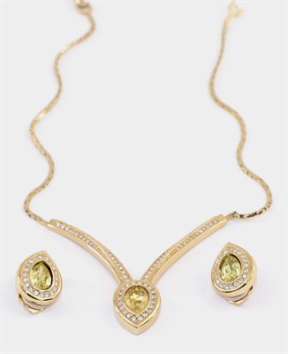 Lot 2187 - A Christian Dior Paste Necklace and Earring Set, the necklace with a V-shaped front with a...