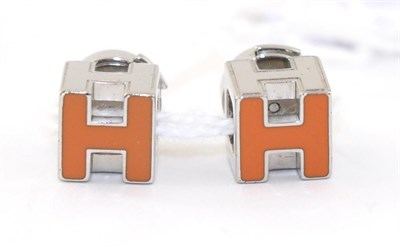 Lot 2190 - Hermes 'Cage d'H' Orange Enamelled 'H' Earrings, post fittings for pierced ears, 'H' measures...