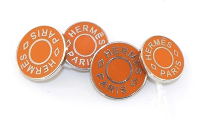 Lot 2191 - Pair of Hermes Disc Cufflink, with orange enamel surrounding 'HERMES PARIS'