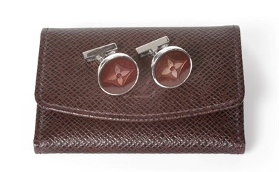 Lot 2193 - Pair of Louis Vuitton Silver and Enamelled Cufflinks, of monogram flower design in burgundy,...