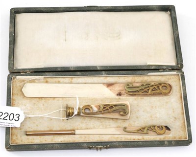 Lot 2203 - Early 20th Century Ivory and Gilt Metal Mounted Scribe Set, including paper knife, seal and pen, in