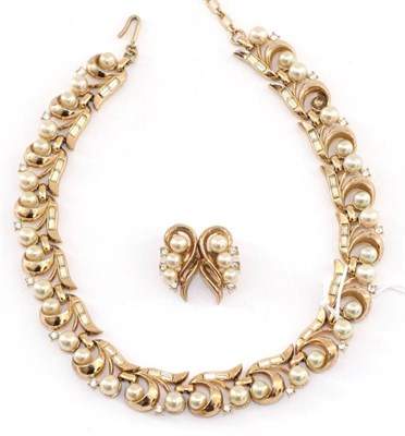 Lot 2206 - A Trifari Necklace and Earring Suite, scroll links set with simulated pearls and baguette cut...