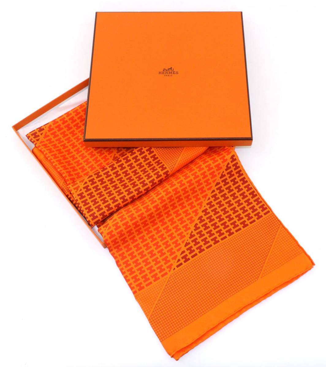 Lot 2235 - Hermes Silk Scarf, with repeat 'H' pattern in orange tones, 90cm square, with original box