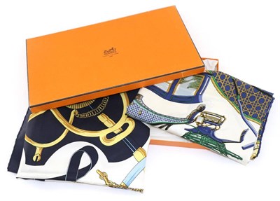 Lot 2236 - Hermes Eperon D'Or Silk Scarf, in white and navy colour way, 90cm square; Hermes Les Voitures A...