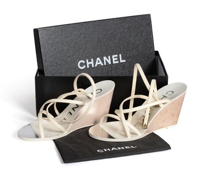 Lot 2254 - Pair of Chanel Cream Strappy Wedges, the 'wooden' wedge heel with silver coloured interlocking 'CC'