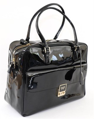 Lot 2255 - Anya Hindmarch Black Patent Handbag, with gilt metal fittings and detachable long strap, 34cm...