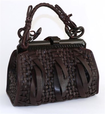 Lot 2264 - A Christian Dior Samourai Woven Leather Handbag, in burgundy woven leather, with acrylic faux...