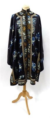 Lot 2268 - Early 20th Century Dark Blue Chinese Silk Robe, embroidered overall with floral motifs in blue silk