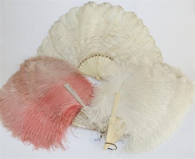 Lot 2277 - Late 19th Century Pink Ostrich Feather Fan, on mother of pearl sticks and guards, 48cm; Two...