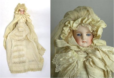 Lot 2000 - Late 19th Century German Bisque Head Bride Doll, with fixed blue eyes, painted eyebrows, closed...