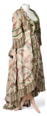 Lot 2037 - 18th Century Ë† la Polonaise Floral Printed Silk Robe, Circa 1770-1780, printed in vibrant...