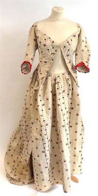 Lot 2039 - 18th Century Cream Silk Open Robe and Matching Petticoat FRONT, Circa 1780-1800, woven with red...