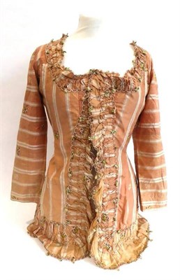 Lot 2047 - Late 18th Century Silk Jacket,  woven with stripes and floral sprays upon a salmon ground, long...