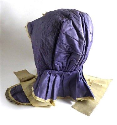 Lot 2050 - Early 19th Century Dark Lavender Silk Bonnet, pleated around the neck, quilted elsewhere, head...