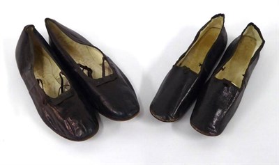 Lot 2068 - Pair of Girl's 19th Century Black Leather Flat Slippers, one pair bearing 'Droit' and 'Gauche'...