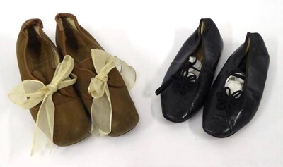 Lot 2077 - Pair of Girls 19th Century Black GlacÅ½ Kid Flat Slippers, lined in cream kid and with a small...