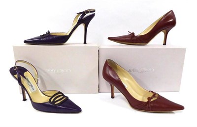 Lot 2159 - Pair of Jimmy Choo Maroon Leather Stiletto Pumps, with pointed toes and knot detail (size 38), with