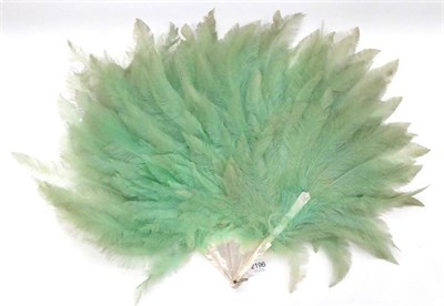 Lot 2196 - Circa 1920's Large Rhea Feather Fan, in an unusual shade of pale green, on white...