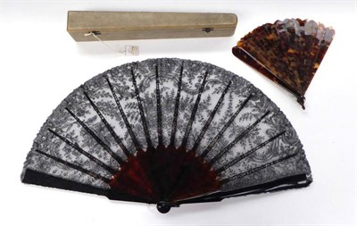 Lot 2197 - Late 19th Century Large Black Lace Fan, on tortoiseshell sticks, the tortoiseshell continuing...