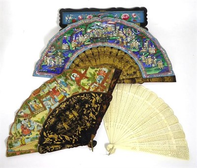 Lot 2199 - Mid-19th Century Chinese Canton Black and Gold Lacquer Ivory Faces Fan, one side depicting a...